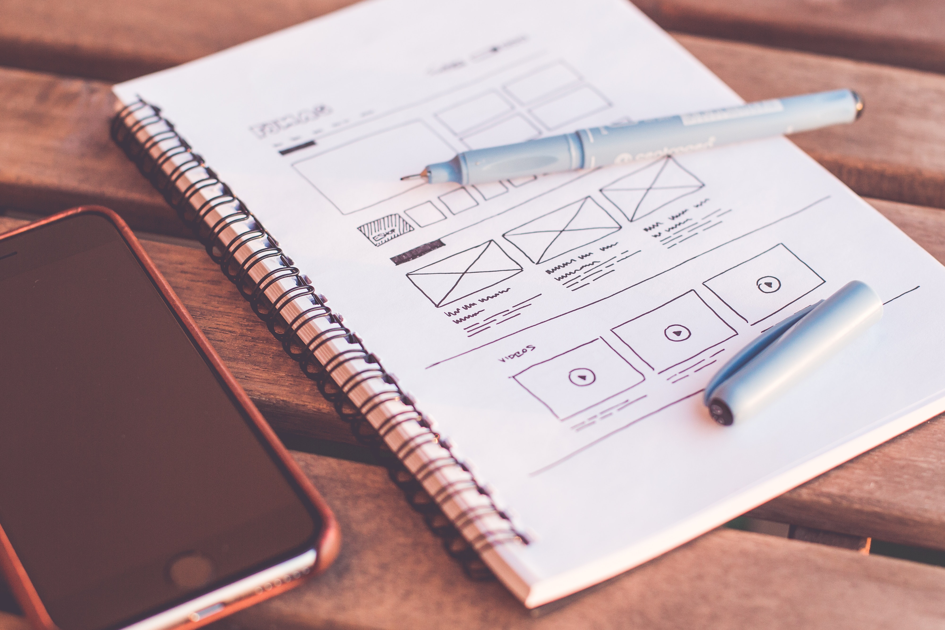 Wireframe sketching on a notebook