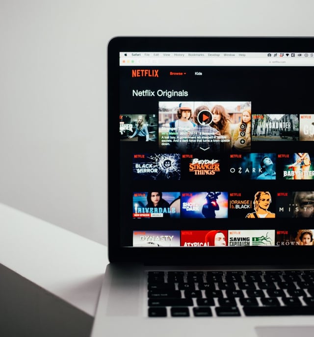 cropped macbook with nextflix home screen