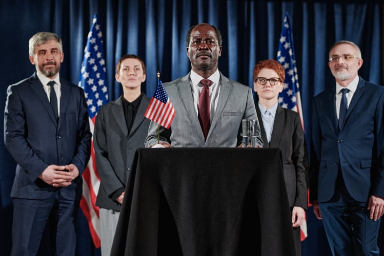 Background image of American leader with his group at conference