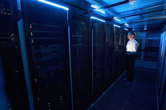 Cybersecurity expert looking at a cloud computing system