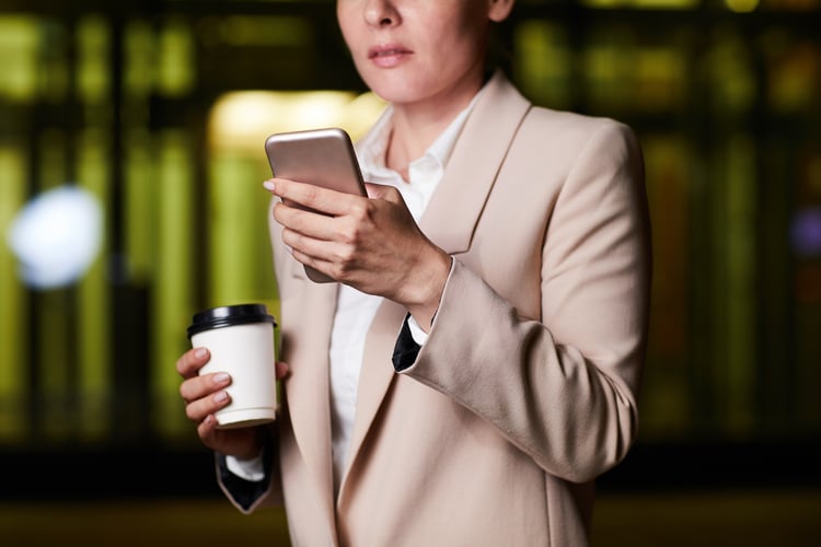 Background image of Checking planner app on smartphone