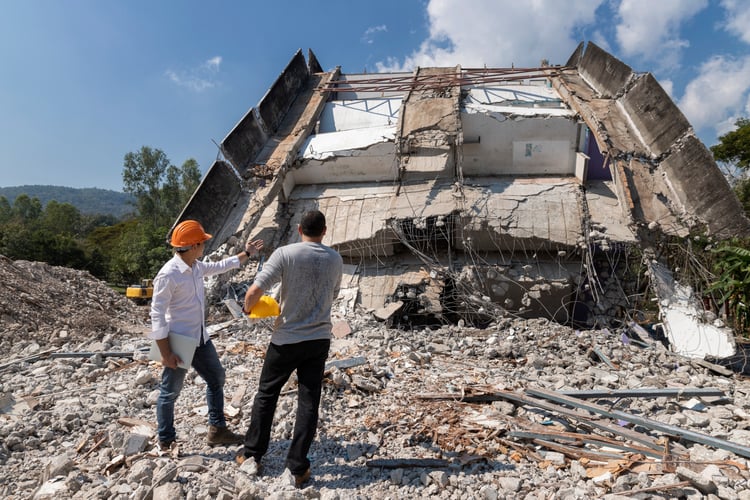 Background image of Demolition control supervisor and foreman discussing on demolish building.