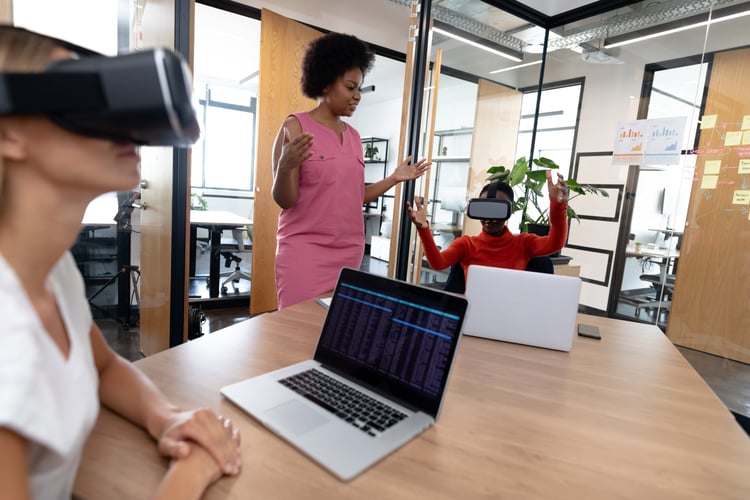 Background image of Diverse group of business colleagues using vr headset in meeting room