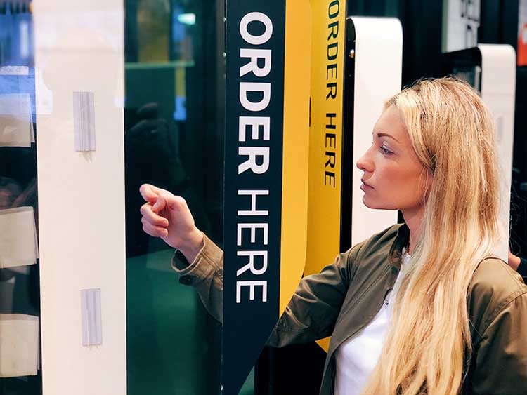 girl-ordering-kiosk