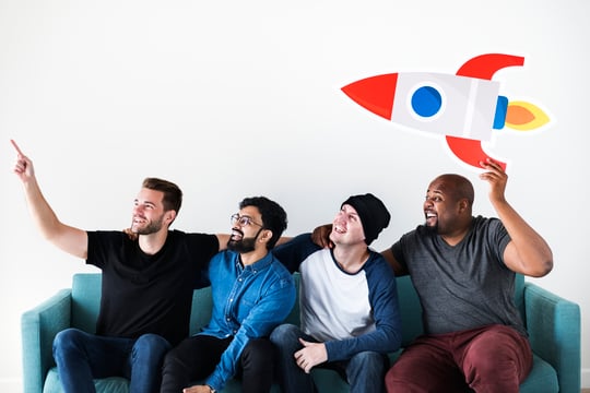 Background image of Group of diverse friends sitting on couch with spaceship icon