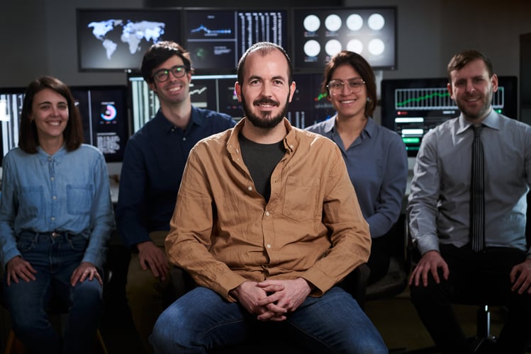 Background image of Happy diverse business people office workers team in row looking at camera.