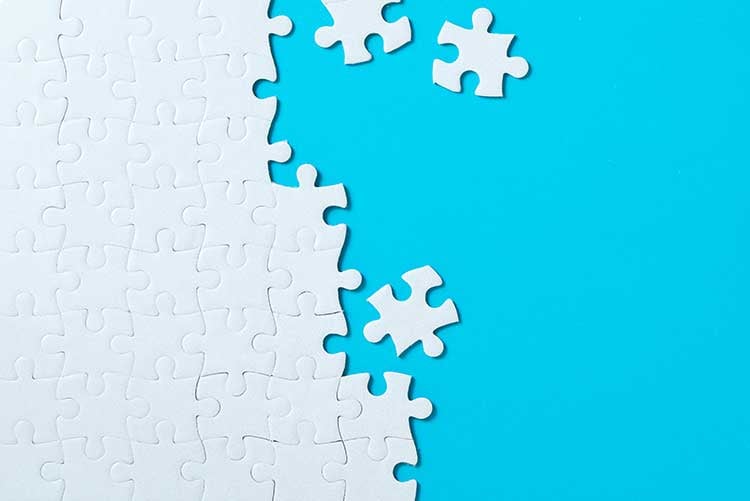 jigsaw-puzzle-pieces-on-blue-background-2022-12-16-12-32-02-utc
