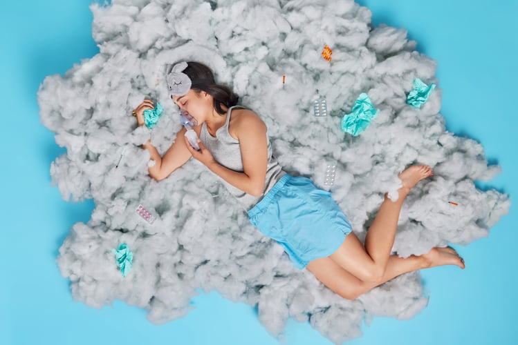Background image of Sick woman has chronic respiratory disease wears nebulizer mask to breath well surrounded by medicam