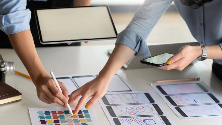 ux-ui-professional-team-with-smartphone-and-tablet-2021-08-31-10-22-04-utc