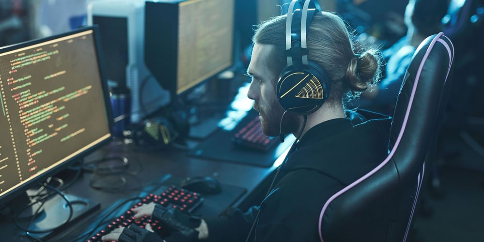 Web developer working on a video game design user experience