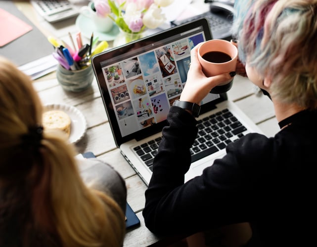 Background image of Woman Hands Holding Coffee Cup Working on Laptop